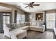 Living room featuring a comfortable sectional sofa, many windows, and a view to the exterior at 700 Daniel Ellis Dr # 5302, Charleston, SC 29412