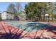 Tennis court and basketball court available with surrounding trees creating an active recreation area at 700 Daniel Ellis Dr # 5302, Charleston, SC 29412