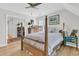 Spacious bedroom with a four poster bed, hardwood floors, neutral paint and lots of natural light at 726 Gypsy Ln, Mount Pleasant, SC 29464