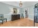 Bright dining room with hardwood floors and elegant lighting, ideal for gatherings at 726 Gypsy Ln, Mount Pleasant, SC 29464