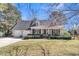 Charming single-story home with a manicured front lawn and a two-car garage at 726 Gypsy Ln, Mount Pleasant, SC 29464