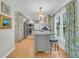 Bright kitchen with a granite island, lots of cabinets and stainless steel appliances at 726 Gypsy Ln, Mount Pleasant, SC 29464