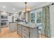 Spacious kitchen with large island, granite countertops, and lots of natural light at 726 Gypsy Ln, Mount Pleasant, SC 29464