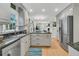 Open concept kitchen with stainless steel appliances, granite countertops, and breakfast bar at 726 Gypsy Ln, Mount Pleasant, SC 29464