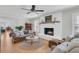 Inviting living room with a fireplace, hardwood floors, and a cozy seating arrangement at 726 Gypsy Ln, Mount Pleasant, SC 29464
