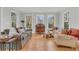 Inviting sitting room with lots of sunlight and comfortable sofas and chairs at 726 Gypsy Ln, Mount Pleasant, SC 29464
