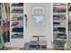 Walk-in closet featuring built-in shelving and rods for optimal organization of clothing and shoes at 726 Gypsy Ln, Mount Pleasant, SC 29464
