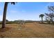 Spacious backyard featuring comfortable seating and scenic water views at 7759 Edingsville Beach Rd, Edisto Island, SC 29438