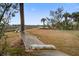Relaxing backyard setting with a hammock and picturesque sunset view at 7759 Edingsville Beach Rd, Edisto Island, SC 29438