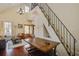 Charming interior with a blend of textures and an open floor plan with a peek into the home at 7759 Edingsville Beach Rd, Edisto Island, SC 29438