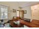 Inviting living room features a skylight, comfortable seating, and an open entryway at 7759 Edingsville Beach Rd, Edisto Island, SC 29438
