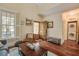 Inviting living room features a skylight, comfortable seating, and an open entryway at 7759 Edingsville Beach Rd, Edisto Island, SC 29438