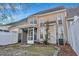 Rear exterior of home showcasing screened in porch and backyard at 804 Buckthorn Cir, Summerville, SC 29483