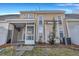 A well maintained backyard with a screened in porch, complemented by a patio and neat landscaping at 804 Buckthorn Cir, Summerville, SC 29483