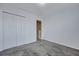 Cozy carpeted bedroom features a closet and doorway, offering a simple yet functional living space at 804 Buckthorn Cir, Summerville, SC 29483