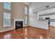 Inviting living room features a fireplace, hardwood floors, and bright windows at 804 Buckthorn Cir, Summerville, SC 29483