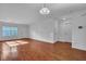 Bright living room featuring hardwood floors and fresh white trim and neutral walls at 804 Buckthorn Cir, Summerville, SC 29483