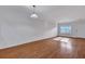 Bright living room featuring hardwood flooring, and large windows offering lots of natural light at 804 Buckthorn Cir, Summerville, SC 29483