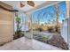 View from screened porch showcasing tiled flooring and view of the spacious fenced backyard at 804 Buckthorn Cir, Summerville, SC 29483