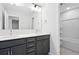 Modern bathroom featuring double sinks, gray cabinetry, and easy access to the shower/tub area at 808 Alma Square Dr, Moncks Corner, SC 29461