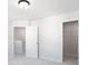 Bright bedroom featuring neutral walls and carpet, with an accessible closet and doorway at 808 Alma Square Dr, Moncks Corner, SC 29461