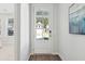 Welcoming entryway featuring a white front door with glass and views to the outdoors at 808 Alma Square Dr, Moncks Corner, SC 29461