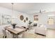 Open-concept living area with dining space, featuring modern decor and ample natural light at 810 Alma Square Dr, Moncks Corner, SC 29461