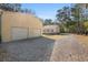 Gravel driveway leading to the home and a large shed at 8255 Chisolm Plantation Rd, Edisto Island, SC 29438