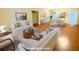 This living room is virtually staged, featuring bright walls, a round dining table and a sofa set at 8255 Chisolm Plantation Rd, Edisto Island, SC 29438