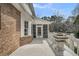 Exterior deck showing back entrance to home and views of the backyard at 8615 Arthur Hills Cir, North Charleston, SC 29420