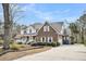 Spacious two-story home boasts classic architectural details and a long driveway at 8615 Arthur Hills Cir, North Charleston, SC 29420