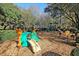 Colorful playground with slides and climbing features, nestled among mature trees at 8615 Arthur Hills Cir, North Charleston, SC 29420