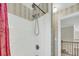 A bright white shower stall is equipped with a shower head on a sliding bar and a separate rain shower head at 8615 Arthur Hills Cir, North Charleston, SC 29420