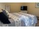 Inviting bedroom featuring a seashell themed comforter and a mirrored closet door at 1001 Jungle Shores Dr # 1/4 Share Interval, Edisto Beach, SC 29438