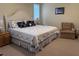 Inviting bedroom with a large bed, side tables, and comfortable seating at 1001 Jungle Shores Dr # 1/4 Share Interval, Edisto Beach, SC 29438