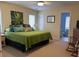 Spacious bedroom with a king-size bed, en suite bathroom, and ample natural light at 1001 Jungle Shores Dr # 1/4 Share Interval, Edisto Beach, SC 29438
