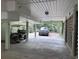 Spacious carport with parking for multiple vehicles, an electric golf cart and additional storage space at 1001 Jungle Shores Dr # 1/4 Share Interval, Edisto Beach, SC 29438