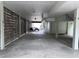 Large open carport area with a covered picnic table and fenced in area on the property at 1001 Jungle Shores Dr # 1/4 Share Interval, Edisto Beach, SC 29438