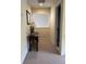 Inviting hallway featuring neutral tones and decor, and a convenient passageway to the bathroom at 1001 Jungle Shores Dr # 1/4 Share Interval, Edisto Beach, SC 29438