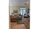 Spacious living room with neutral tones, ceiling fan, and lots of comfortable seating at 1001 Jungle Shores Dr # 1/4 Share Interval, Edisto Beach, SC 29438