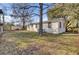 View of the backyard with a shed and mature trees at 111 A Heatley St, Moncks Corner, SC 29461