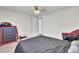 Bedroom with a bed, dresser and 2 doors leading out of the room at 111 A Heatley St, Moncks Corner, SC 29461