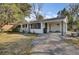 Cozy single story home with a gravel driveway and a convenient carport at 111 A Heatley St, Moncks Corner, SC 29461