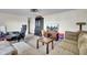 View of living room with a couch, desk and a TV with home entertainment setup at 111 A Heatley St, Moncks Corner, SC 29461