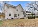 A spacious backyard with a pergola, mature trees, and lawn at 113 Hartley Hall Ct, Summerville, SC 29485