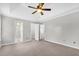 Open view of the spacious bedroom that highlights the multiple walk-in closets and bathroom entrance at 113 Hartley Hall Ct, Summerville, SC 29485