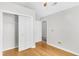 Bright bedroom with hardwood floors and a large closet at 113 Hartley Hall Ct, Summerville, SC 29485