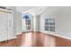 Inviting front entry featuring a picture window, sidelight windows, and transom window at 113 Hartley Hall Ct, Summerville, SC 29485