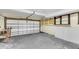 Spacious garage with storage shelves and an automatic door opener at 113 Hartley Hall Ct, Summerville, SC 29485