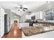 Well-lit kitchen with white cabinetry, granite countertops, and stainless steel appliances at 113 Hartley Hall Ct, Summerville, SC 29485